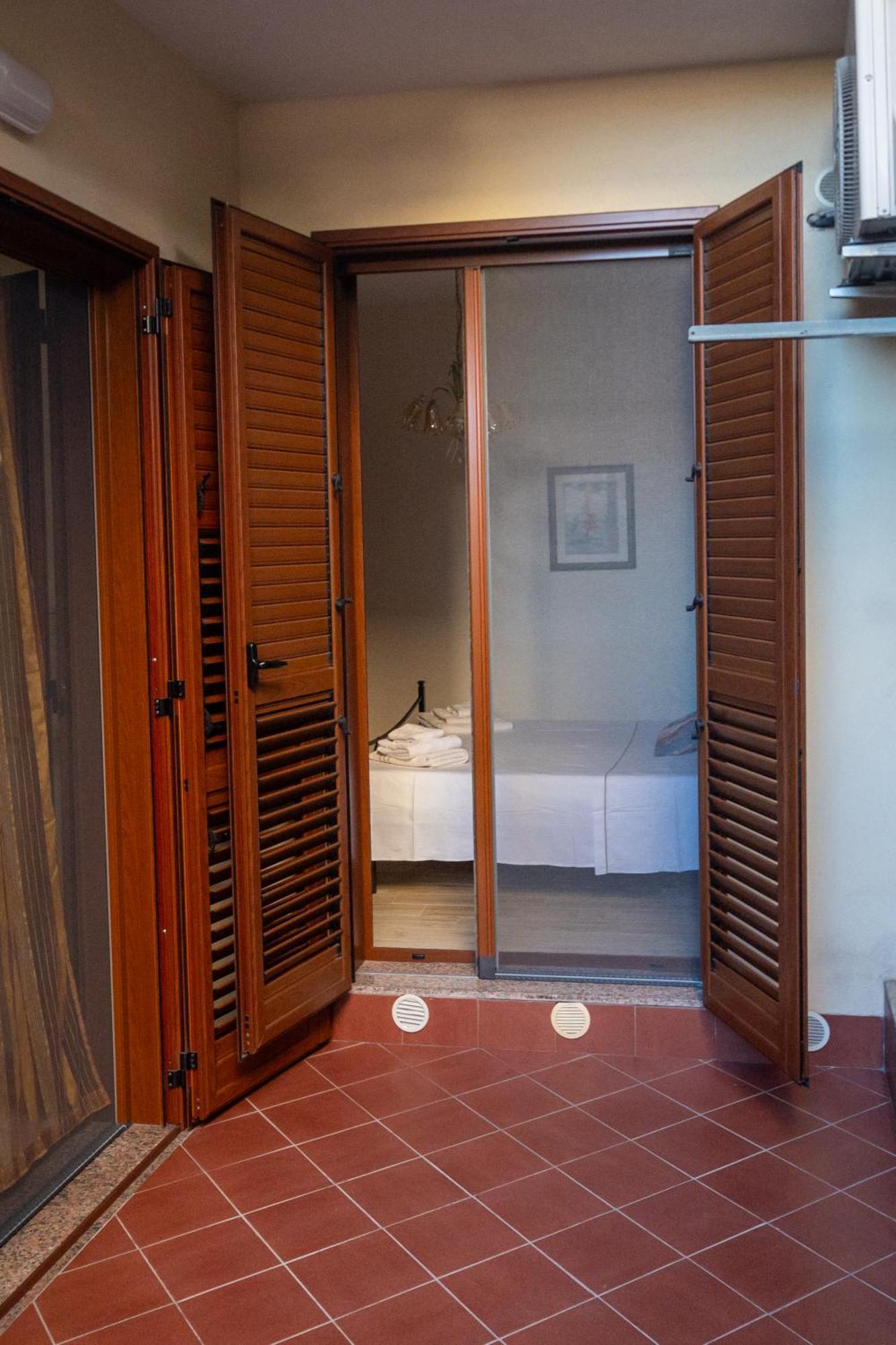 אנלציט Corallo Holiday House Acitrezza מראה חיצוני תמונה